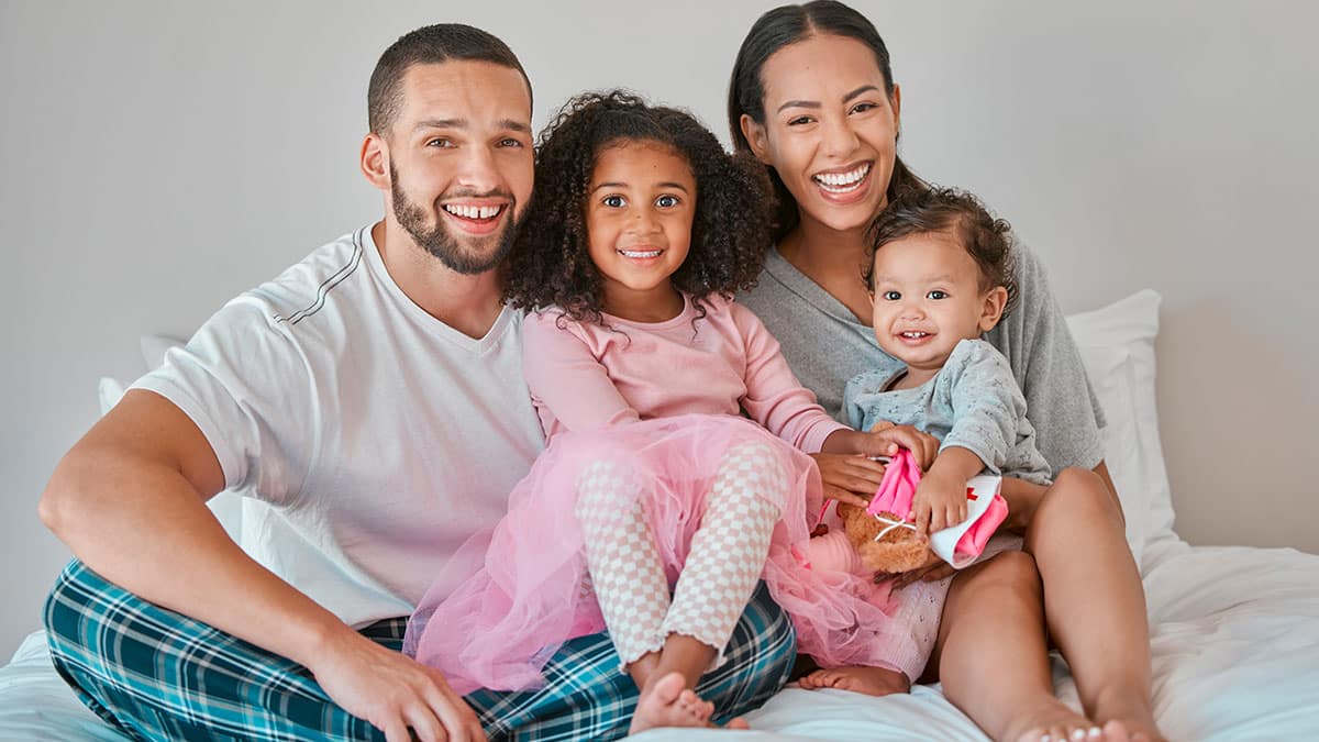 Happy family enjoying their air conditioning